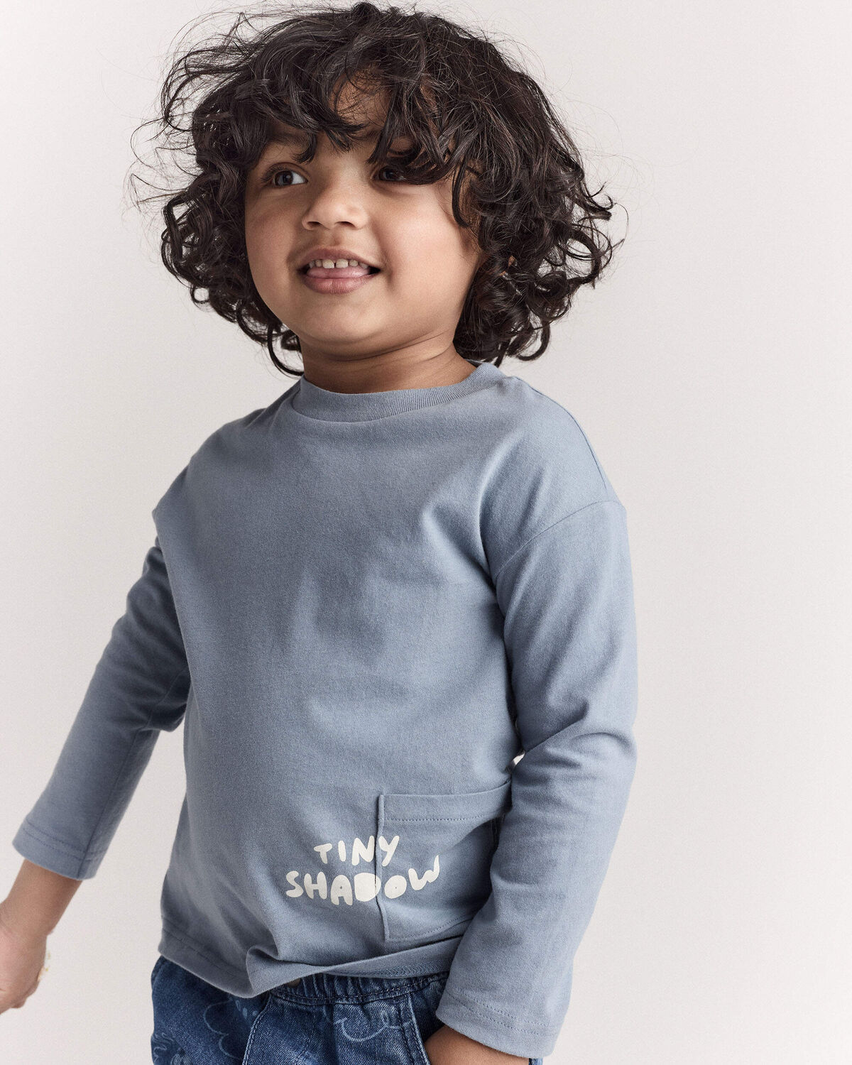 Toddler 'Tiny Shadow' Long-Sleeve Pocket Graphic Tee - Blue 1 Toddler 'Tiny Shadow' Long-Sleeve Pocket Graphic Tee - Blue