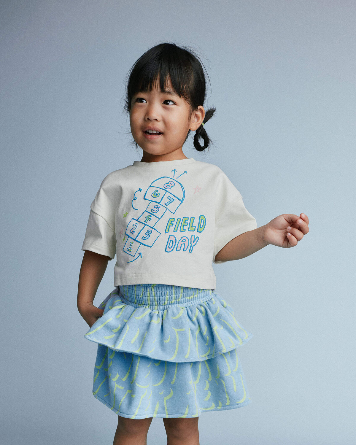 Toddler Girl 'Field Day' Breezy Top in Hopscotch Print - Cream 3 Toddler Girl 'Field Day' Breezy Top in Hopscotch Print - Cream