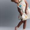 Toddler Girl Avenue Twirl™ Dress in Character Print - Cream 4 Toddler Girl Avenue Twirl™ Dress in Character Print - Cream